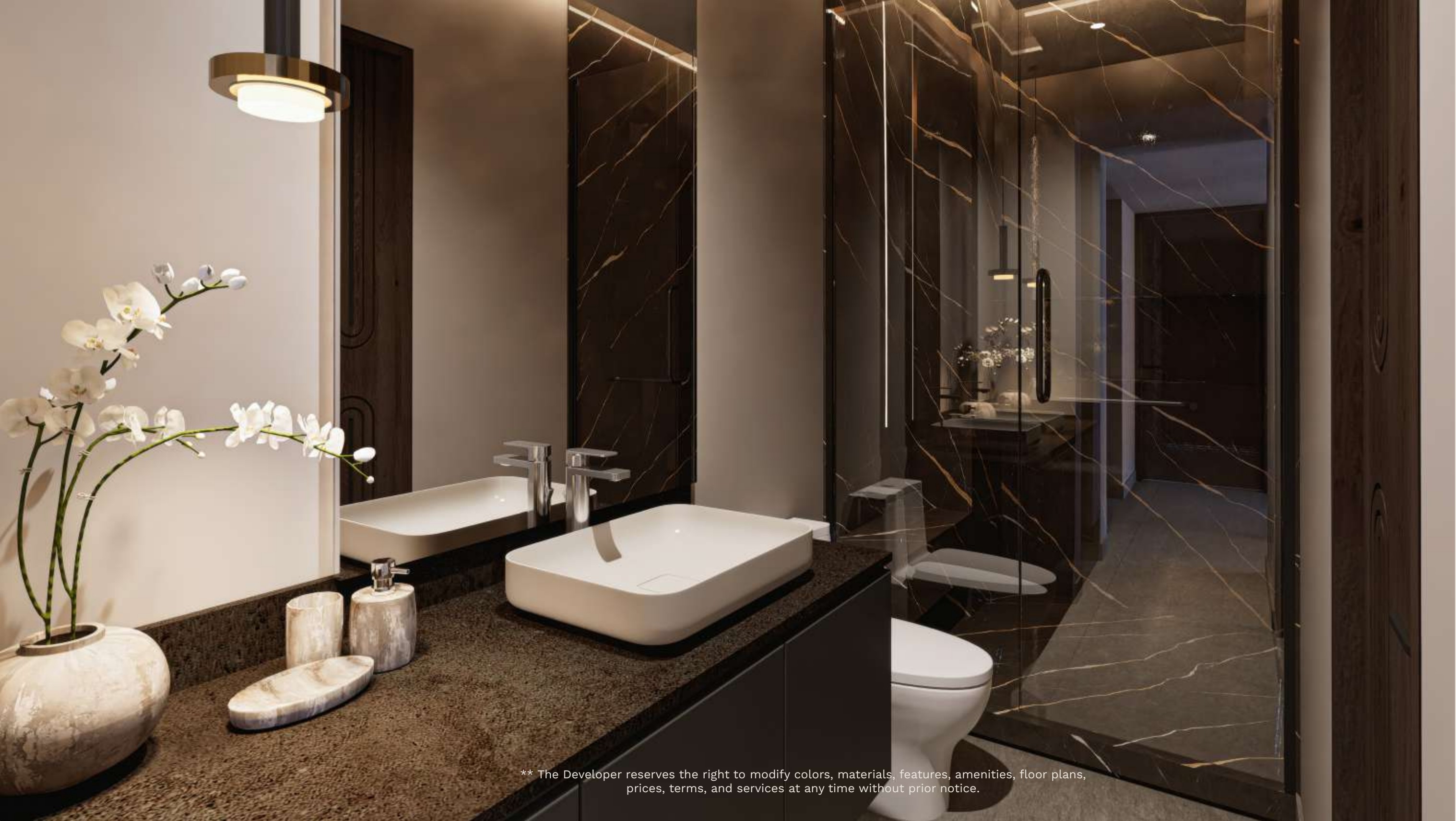 Modern bathroom with dark stone finishes